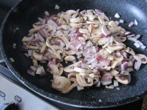 Top Fat Burning Foods - Fry Onions and Mushrooms in Skillet